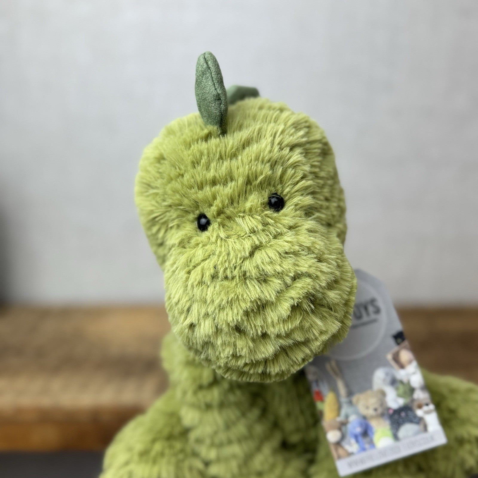 Jellycat Medium Fuddlewuddle Dinosaur - Green Sitting Textured Dinosaur Soft Toy