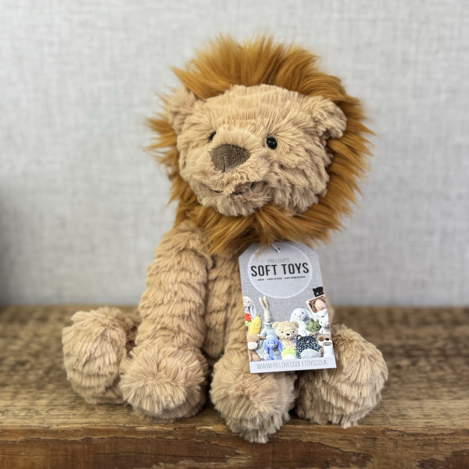 Jellycat Medium Fuddlewuddle Lion - Textured Sitting Lion Beanie Soft Toy 9”