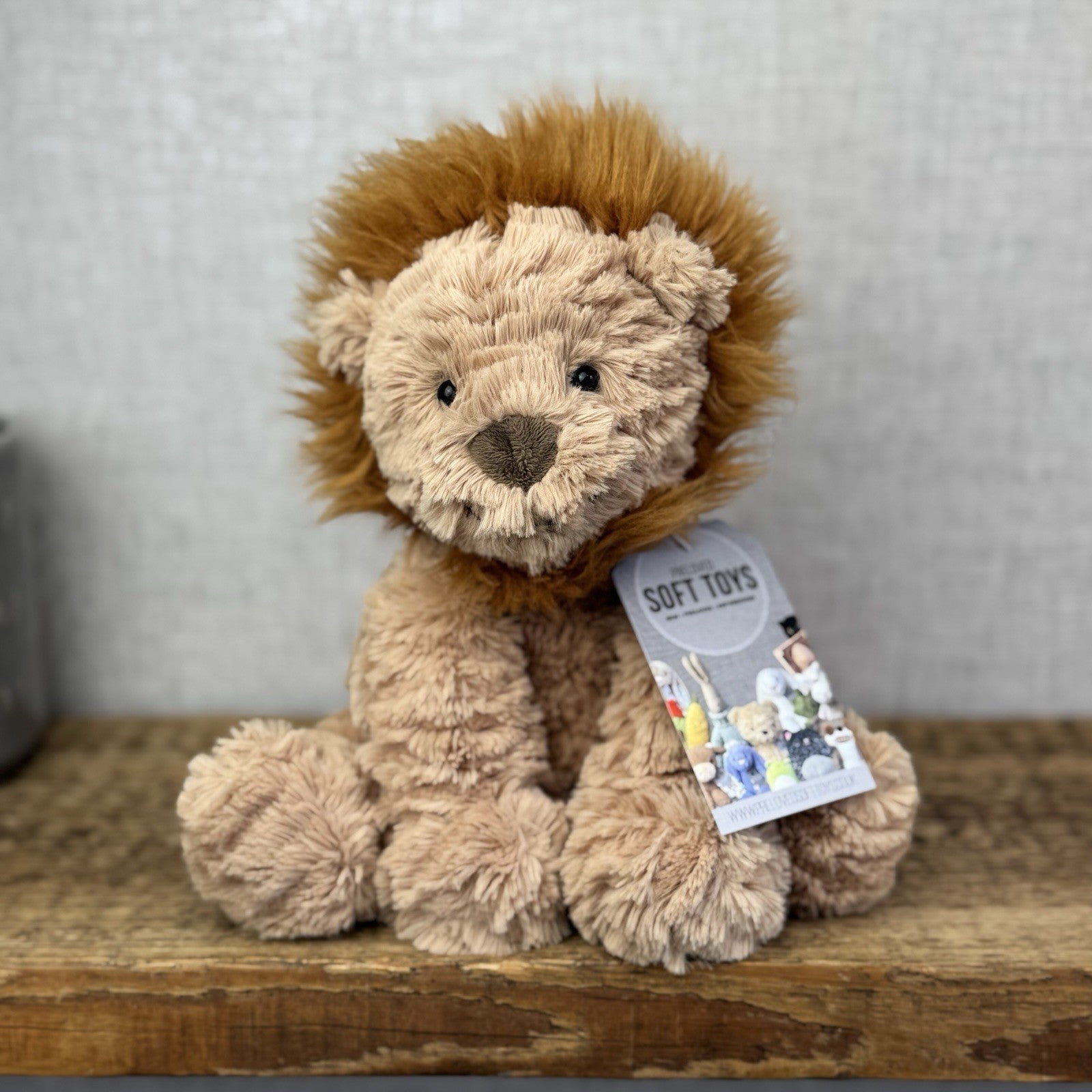 Jellycat Medium Fuddlewuddle Lion - Textured Sitting Lion Beanie Soft Toy 9”